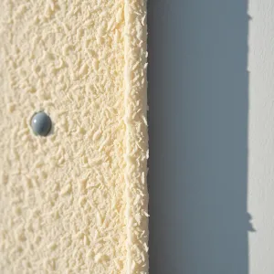 Montaż wełny mineralnej na ścianie zewnętrznej